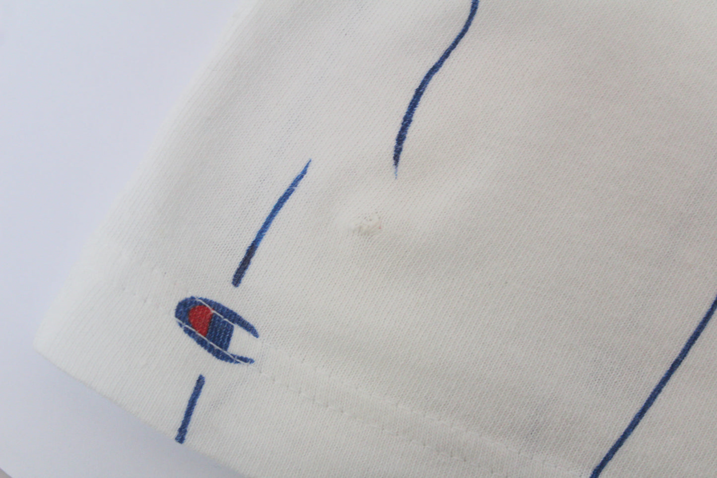 CHAMPION VINTAGE LOGO ALL OVER T-SHIRT SMALL